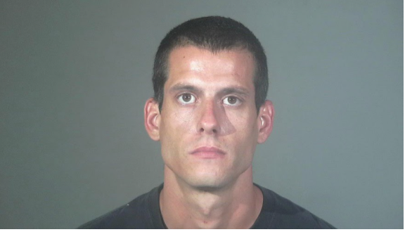 An image of Gregory Howell taken from a booking photo released by the Torrance Police Department. Although both he and his wife were arrested on July 24, he was the only one that was charged and was set a court date, for the higher amount of evidence connecting him to the charges of vandalism.
