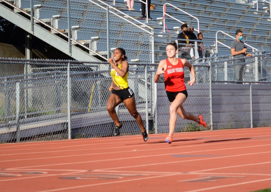 Seconds away from the finish line, Amor Jones (11) gives it her all in a battle for first against the Palos Verdes sprinter in the varsity girls’ 200m race. On Saturday, March 20th, West High Track & Field kicked off their season with a friendly dual meet against Palos Verdes High School. Jones described her feelings about returning to the track for races once again: “I can admit I was nervous, but me being nervous I feel made me more prepared... while I was running it felt like I was floating in a way.”