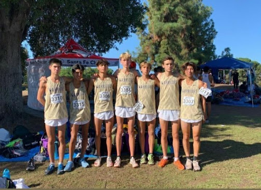 West High Boys’ Varsity Cross Country team placed third this year at the annual Clovis Invitational. Though they are a Division III team, they successfully competed against Division I and Division II teams from northern and central California. Picture courtesy of Frank Wong (11).