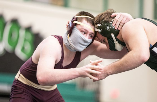 Sports everywhere have felt the hit of the pandemic. In the larger wrestling world, masking and protection are required as shown. Until the pandemic is over, this will be the norm. Photo courtesy of Sean Simmers on pennlive.com