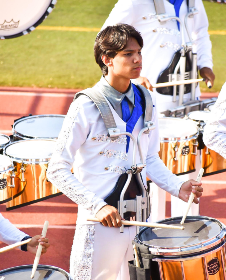 Kaiawe Miyasato (12) can almost always be found with a pair of drumsticks and a set of drums. Though he’s been playing since childhood, Miyasato gained a love for performing through his experiences at West High, and hopes to continue performing the drums after graduation. Photo Courtesy of Kaiawe Miyasato (12). 