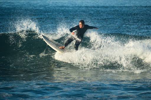 Shant Mazmanian (12) catches a wave as he practices on a sunny Saturday morning. Surfing is a sport that requires great passion and dedication, and Manzmania has both. His perseverance has allowed him to compete against South Bay’s top high school surfers.