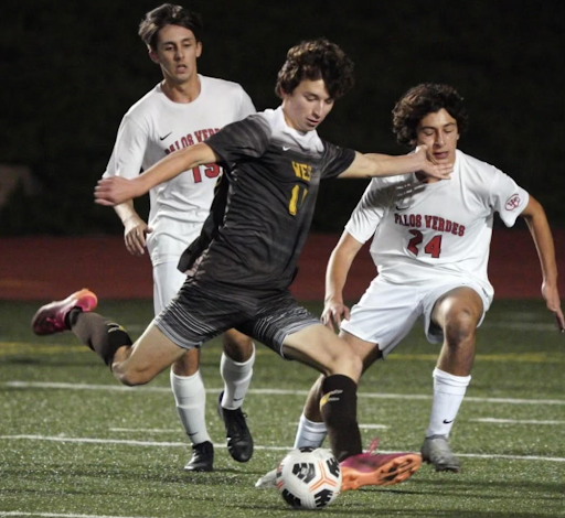 Successfully avoiding the opposing team, forward Zachary Mercieca (11) scores yet another goal in a game against Palos Verdes. Mercieca has been playing on West’s Varsity Soccer team since his freshman year, showing amazing plays with every returning season. Coach Shimizu of Boys’ Varsity Soccer described Mercieca as “a devastating player who a single defender cannot stop.” Photo courtesy of Zachary Mercieca (11).