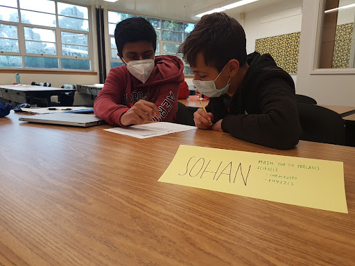 As a tutor for Tutorial Club, Sohan Devalapurkar (11) helps students in the library at lunch and after school free of charge. In addition to offering help on a regular basis, Tutorial Club tutors plan to help teachers during potential cram sessions before finals.