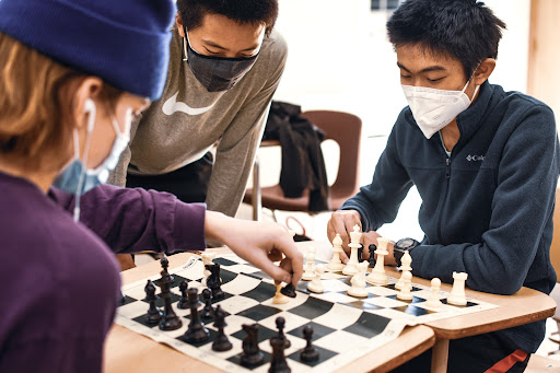 In the middle of a fierce match, West High Games Club members compete against each other in a chess tournament hosted on February 4, 2022 after school. All skill levels were welcome and winners received gift cards to Target. Tournament participant Elizabeth Kim (10) shared that “when I heard there was a chess tournament I was like – woah! And it just seemed like a fun after-school thing.”