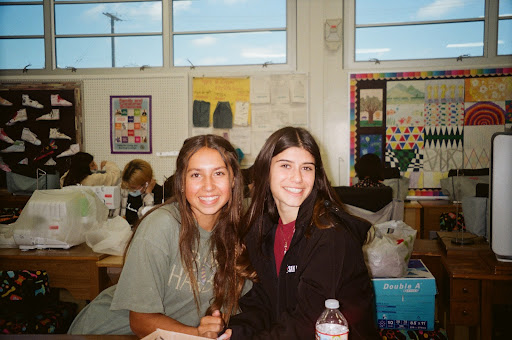 Spending their lunch time together, Kayla Millican (12) and France Garcia (12) share some laughs. “We’ve known each other since freshman year and I’ve known most of the seniors my entire life, so it’s sad to think that we are all going our separate ways,” Garcia commented. The past 12 years sure went by fast, but the friendships made through the years will last a lifetime. 
