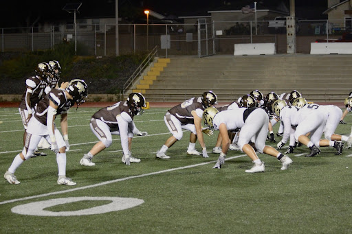 The West High Warriors prepare to face off against the Peninsula Panthers. The night of September 9 was filled with cheers and roars from the audience during the Varsity football game. Fans at the edge of their seats watched the West Warriors fight hard in order to maintain their lead of 28-0 at halftime. In the end, the Warriors secured the win with a score of 28-21.