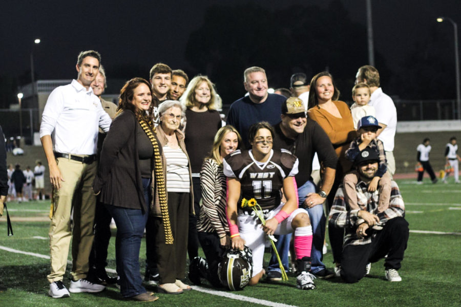 Linebacker and fullback Tyler Schlappatha (12) and family. 