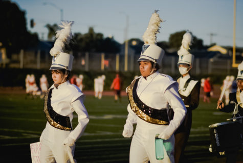 On Friday, Sept. 23, Drum Major Riyana Roy (12) and Assistant Drum Major Yumiko Kasai (11) led the West High Entertainment Unit in a home football game against Redondo Union High School. 