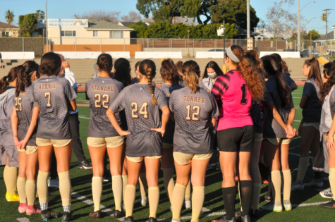 The West High Girls’ Soccer team huddles up seconds before kickoff against the opposing team, Mira Costa. After an outstanding 2021-2022 season of being League and State Champions, these girls are reading to reach their fullest potential and bring it all home for a second time.