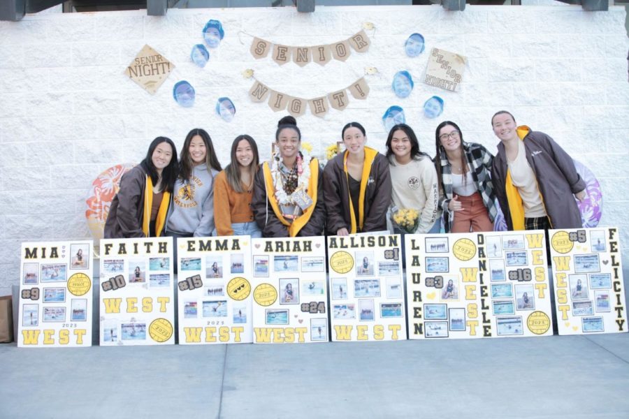 Celebrating a sweeping 23-3 victory over North High, West High Girls Water Polo team clutch hand-decorated posters made by underclassmen teammates. Plastered with photos courtesy of Sally Yuguchi (mother of two seniors on the team), the team had scheduled a time for a photoshoot against a crisp sunrise and a beautiful beach backdrop. “It was definitely an early 
morning, but we all had fun. And we love the outcome of the pictures, they always turn out great!” Senior varsity player Emma Yuguchi (12) commented. From left to right: Mia Yuguchi, Faith Iwanaka, Emma Yuguchi, Ariah Garcia, Allison Tsai, Lauren Cua, Danielle Ciscel, Felicity Matthews. Photo courtesy of Sally Yuguchi. 
