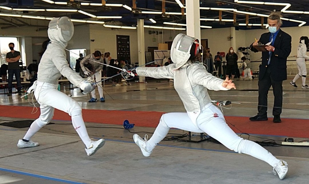 Even as a high school student, Kira Erikson (11) (right) has made  a name for herself in the fencing world. Training from a young age, Erikson dedicated herself to daily practices, always pushing herself to improve. Photo courtesy of Kira Erikson (11).