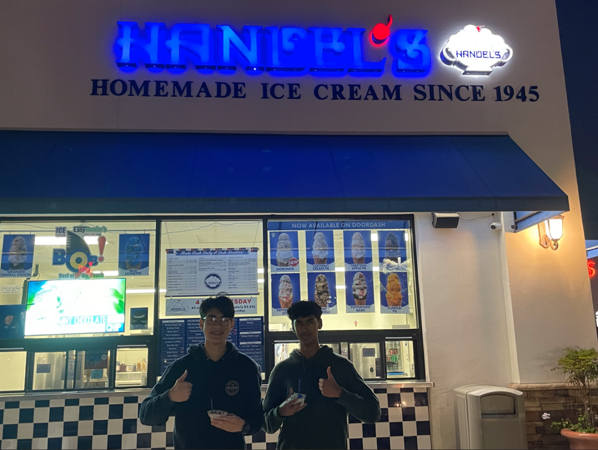 Shortly after school on Dec. 7, Rohith Krish and his friends buy ice cream at Handel’s to support West High. From left to right: Joshua Lee (11), Rohith Krish. 