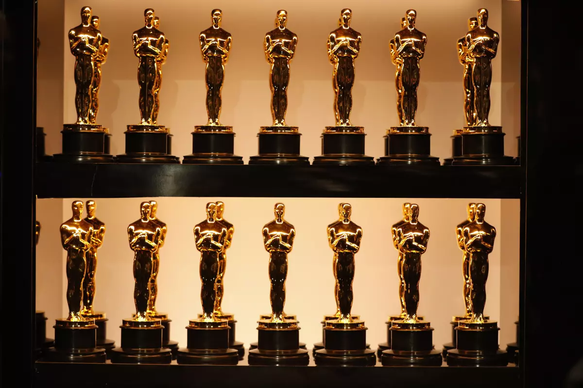 The highly coveted Oscar trophies illuminate on the display ahead of the 96th Academy Awards. This year, late-night comedian Jimmy Kimmel reprised his role as host.
