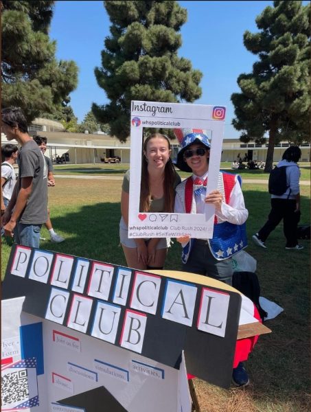 Political Club attracted new members by their interactive stand at West High’s Club Rush. PC hopes to provide students with a greater insight into the political scene so that they can make well-informed decisions as they employ their voices to the world. The photo spotlights PC’s publicist Amanda Bruers (12) on the left and club president Ethan Lam (12) on the right. 
