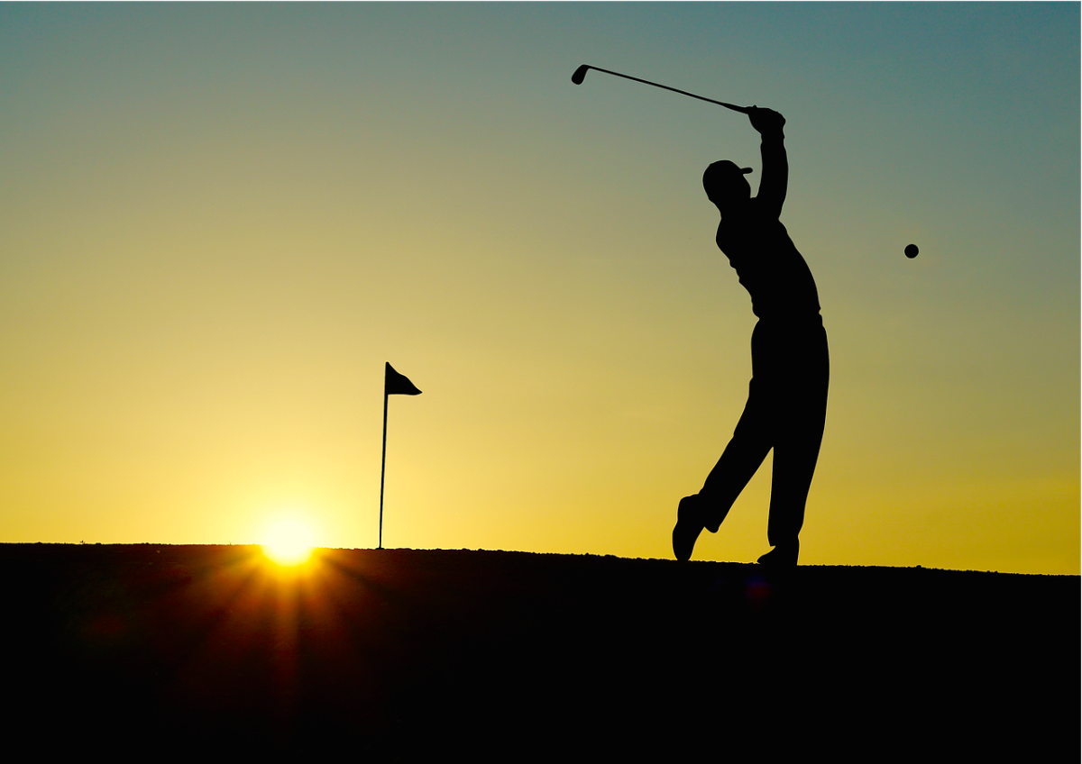 Tranquility, deep focus, and a serene sunset are illustrated as a golfer makes his stroke. 
