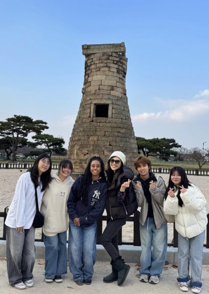 Attending Members of the trip pose in front of Cheomseongdae astronomical observatory located in Gyeongju, Gyeongsang Province. From left to right, Hannah Kang, Miu Koashi (10),  Lyrik Salausa, Mrs. Lee, Adxel Tapangan, and Sarasa Goshi (10). Photo courtesy of Mrs. Lee. 