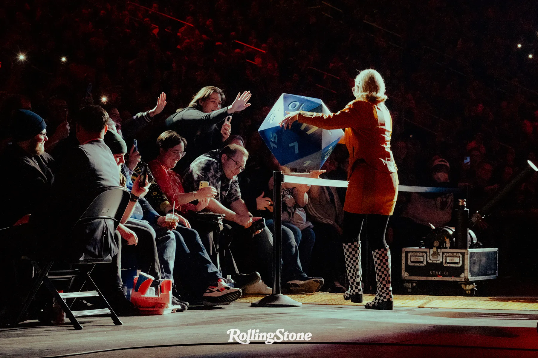 Dimension 20’s Siobhan Thompson asks audience members in the sold-out Madison Square Garden to “bless the dice” before making one of the most important rolls of the night. Superstitions regarding dice and luck have been something that brings a sense of community and solidarity to players of TTRPGs.
