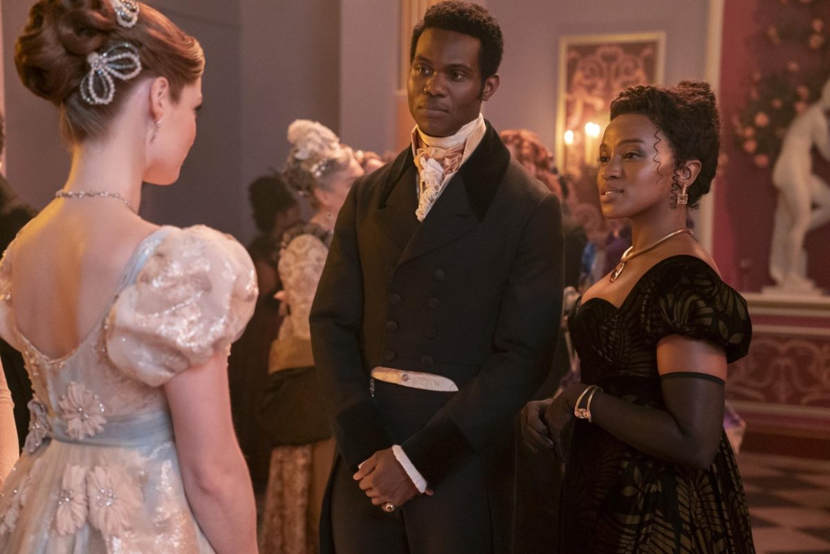 Hannah Dodd (left) as Francesca Kilmartin, Victor Alli (middle) as John Kilmartin, and Masali Baduza (right) as Michaela Stirling in the finale of “Bridgerton” season three. The changes that were introduced with Baduza’s casting as Michaela has led to fans criticizing the  young actress which Shondaland producers, as well as other members of the cast have had to speak out upon.
