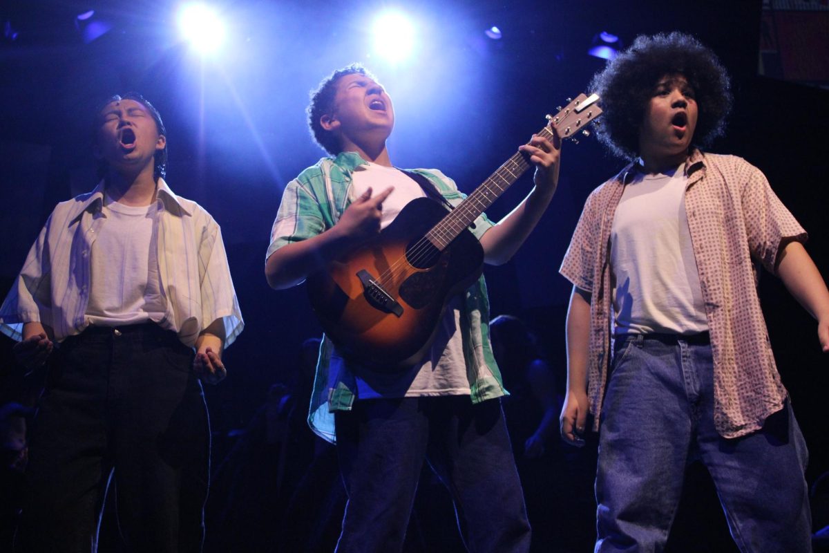 West High School's spring musical, Grease, features Sonny, Doody, and Roger performing "Rock and Roll Queen" on stage. This story followed the lives and romances of high school students in the 1950s. The whole cast brought a lot of energy to the performance and made the production a great success.

