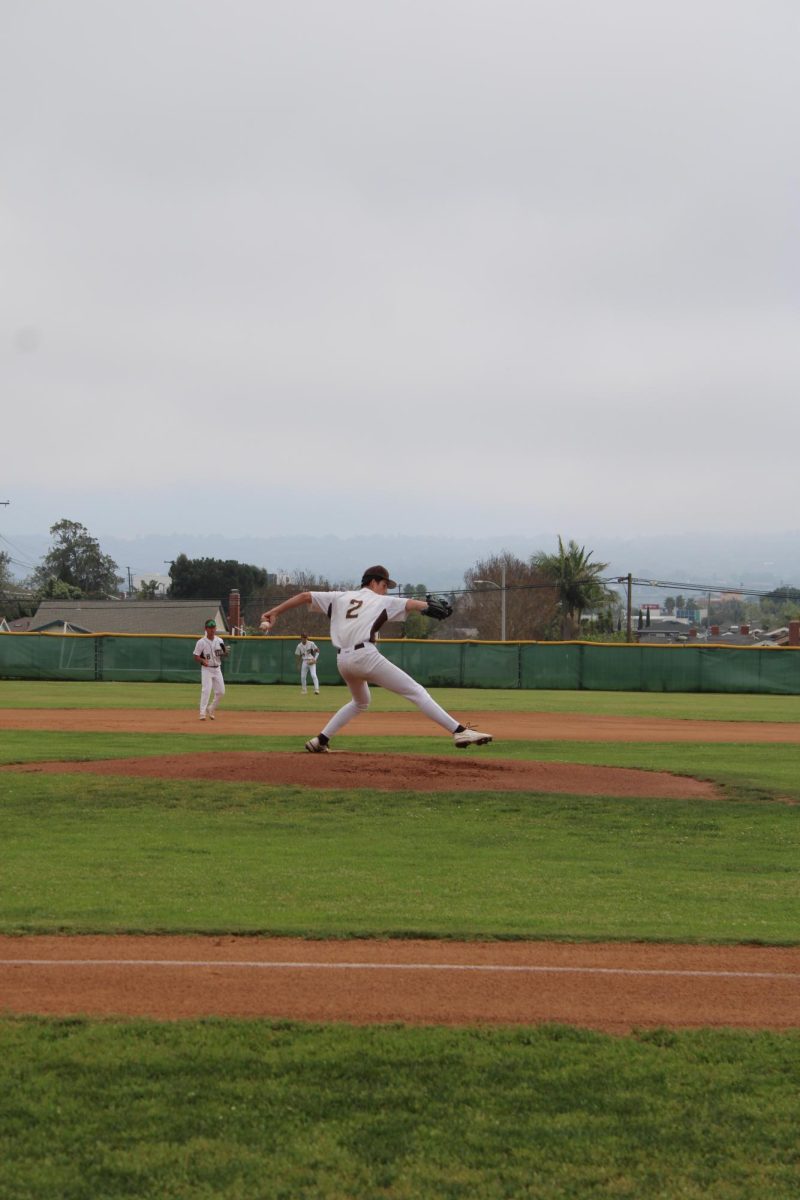 West High JV boys baseball pitcher Mikey Hagaman (10), #2 prepares to deliver a pitch during their game against Palos Verdes. His team was ready in the field behind him as the play developed. West fell 4–9 in the matchup.
